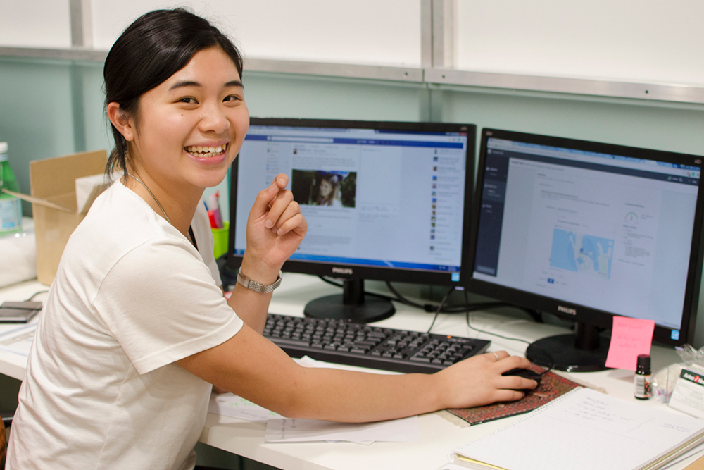 intern sits at a desk in beijing