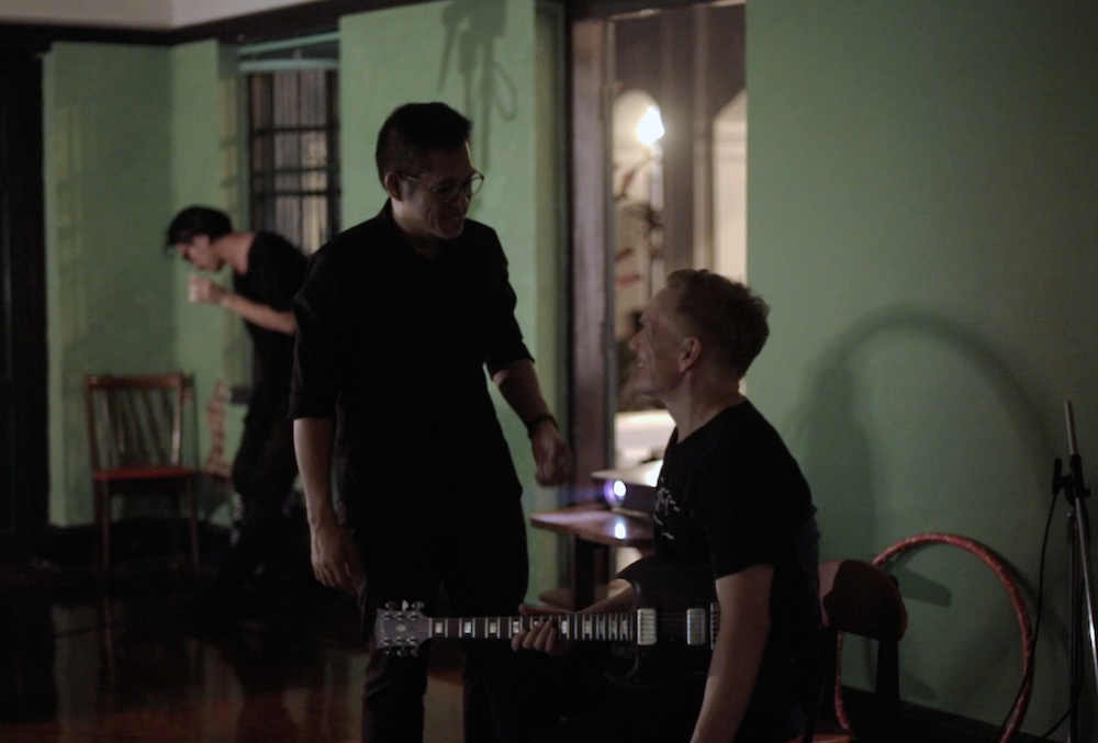 Shayne and Arnont chatting during Shane's residency at Bangkok 1899