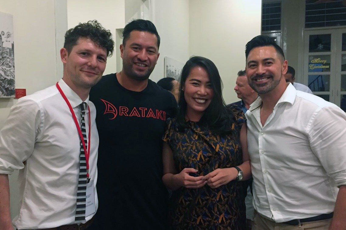 A line up of three men and a woman