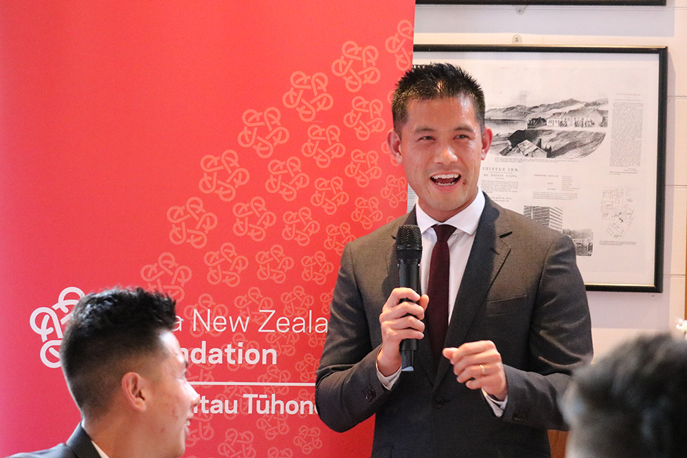 Wilson Chau speaking to a group