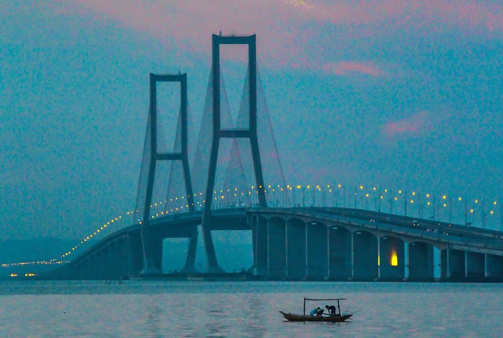 A road bridge spanning a stretch of water