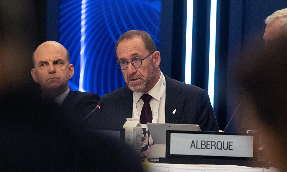 Defence Minister Andrew Little sitting at a desk addressing the room