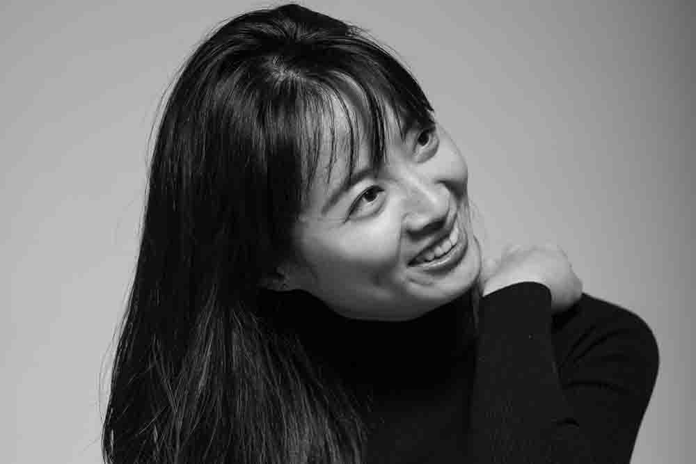 A portrait photo of artist Yixuan Zhu