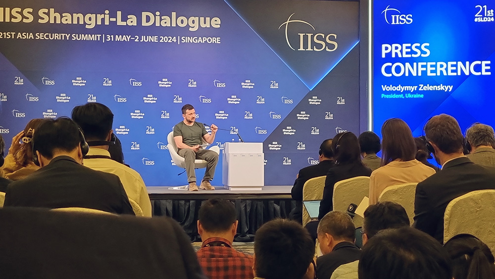 Ukraine's President Volodymyr Zelenskyy addressing the audience
