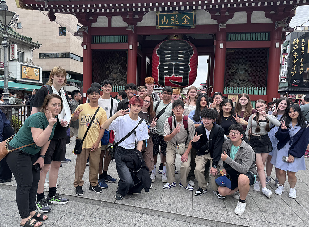 The Riccarton students posing for a photo outside of a shrine