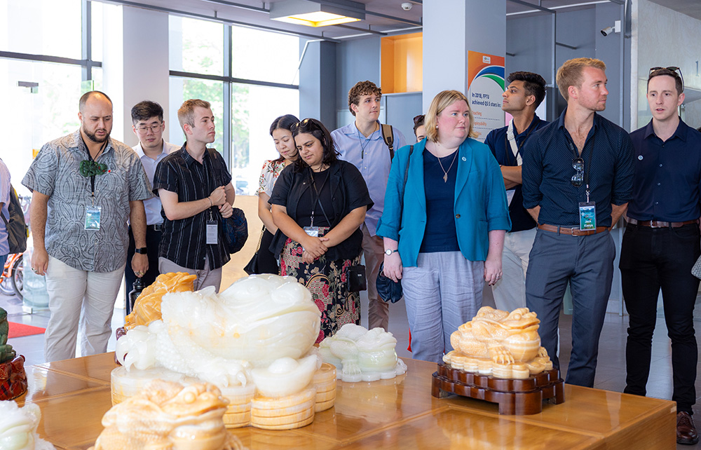 A group of Leadership Network members looking at jade sculptutes