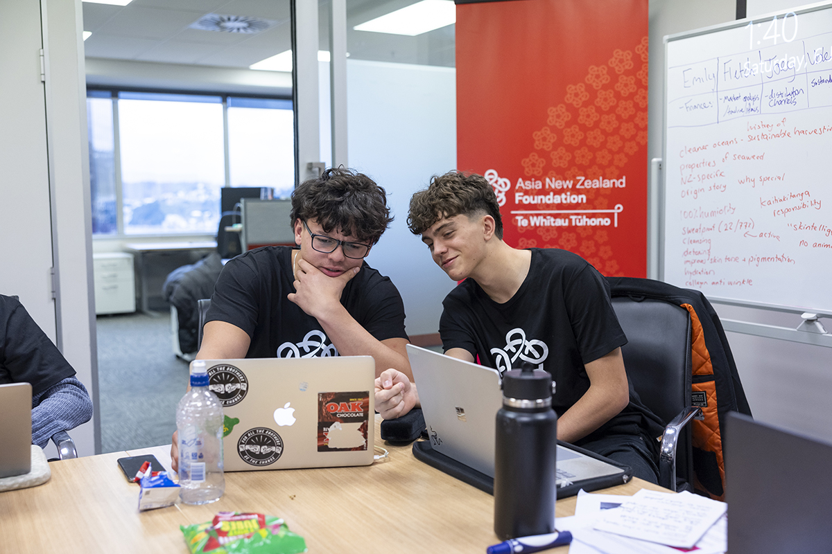 Two of the Foundation team looking at a laptop