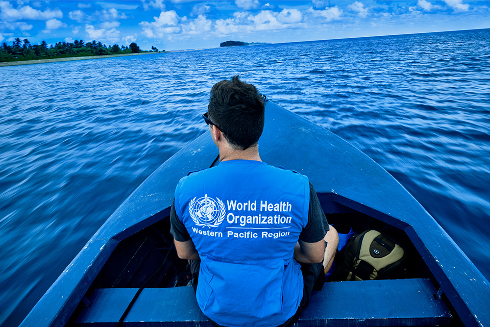 Will wearing a World health Organisation t-shirt in the prow of a small boat