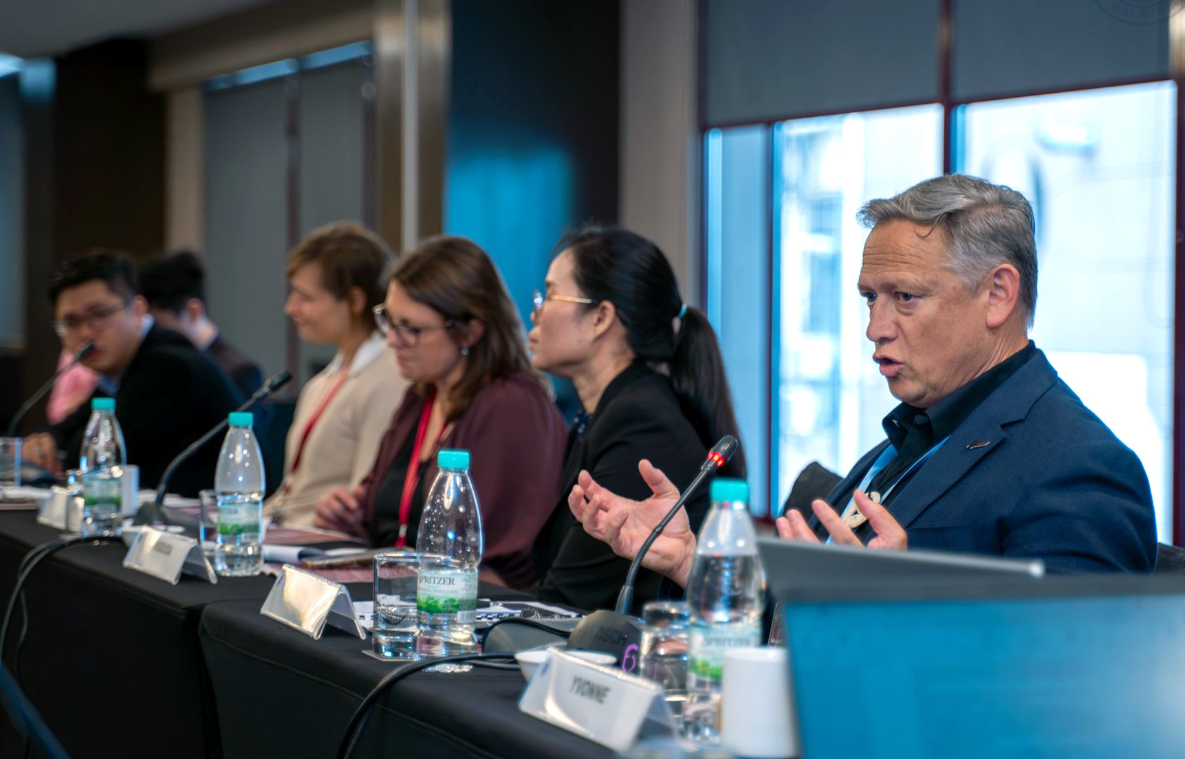 Hone McGregor speaking at a roundtable event