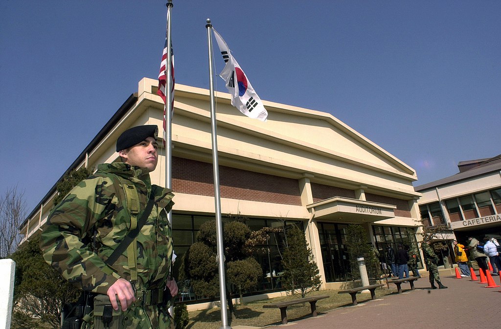 A US soldier standing outside a military building in Busan
