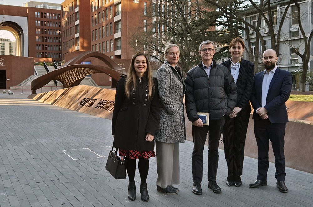 Suzannah Jessep standing with a delagation of four other Track II delegates
