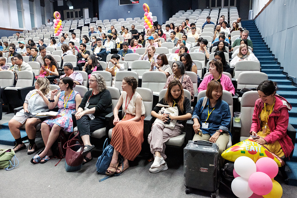 The NZ delegation in an auditorium with other Splice Beta delgates