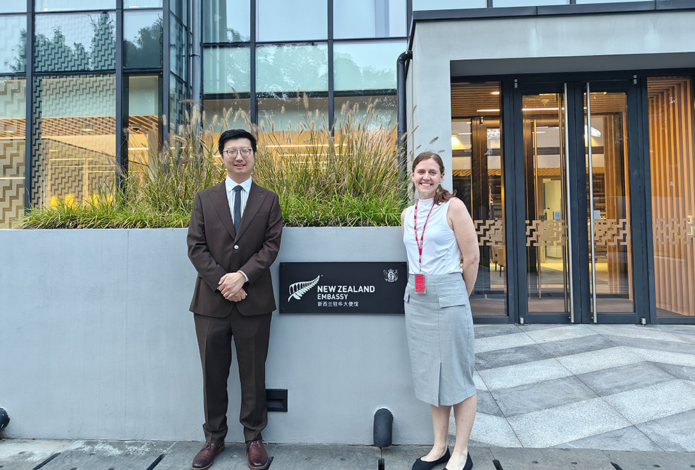Valerie outside the NZ Embassy in Beijing with Michael Zhang from Education New Zealand