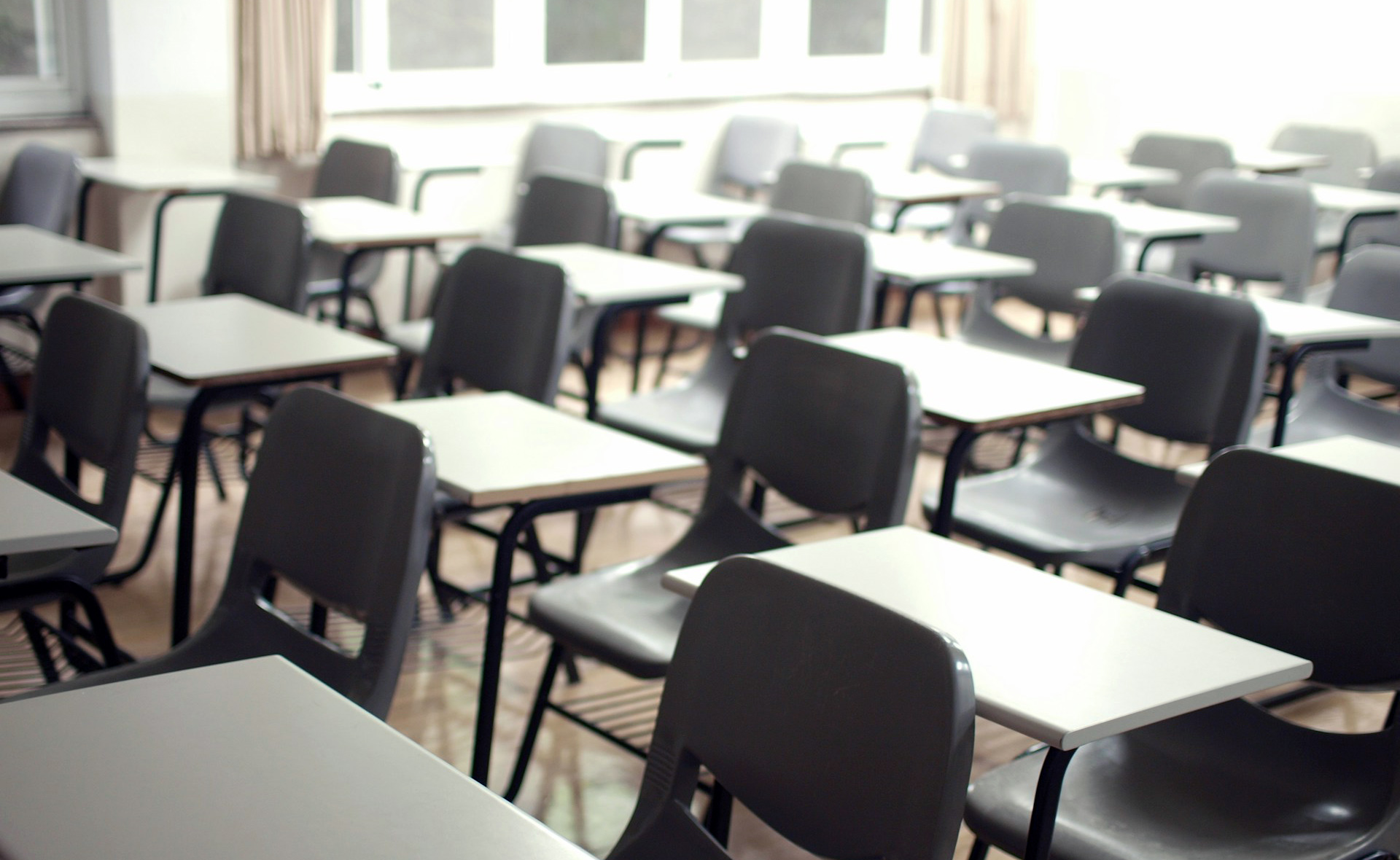 A classroom of empty chairs