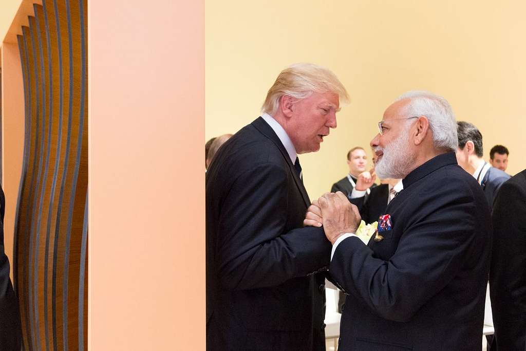 Trump and Modi shaking hands