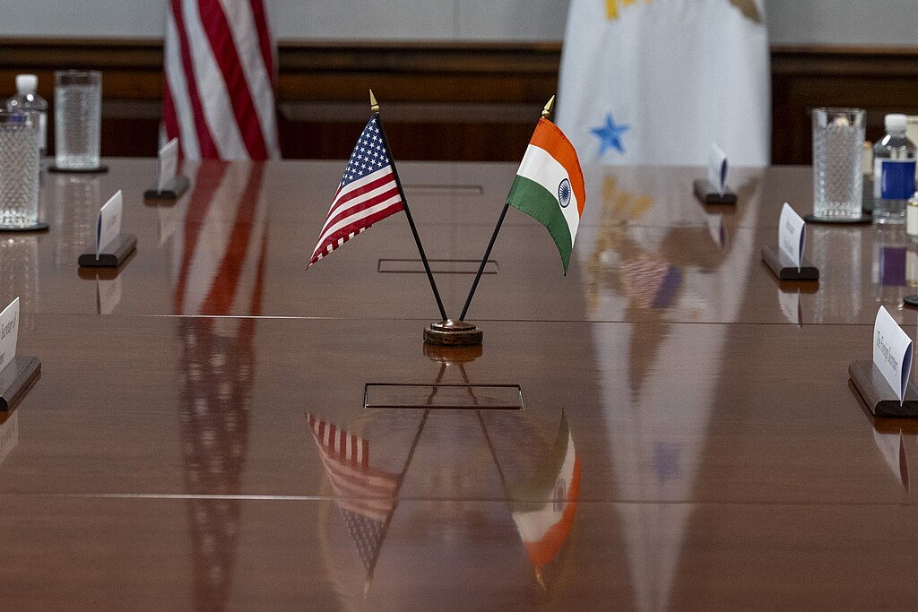 Small India and United States flags of a long desk