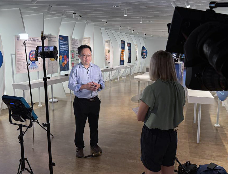 Kate interviewing Associate Prof Choy Ban Heng