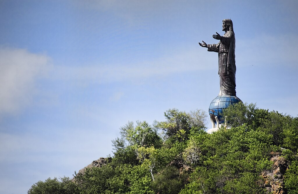 The statue Christo Rei, meaning Christ the King, on the top of a hill in Dili