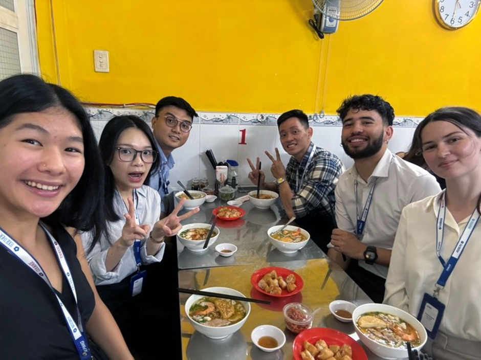 Beth and colleagues having a lunch of noodle soup at a cafe