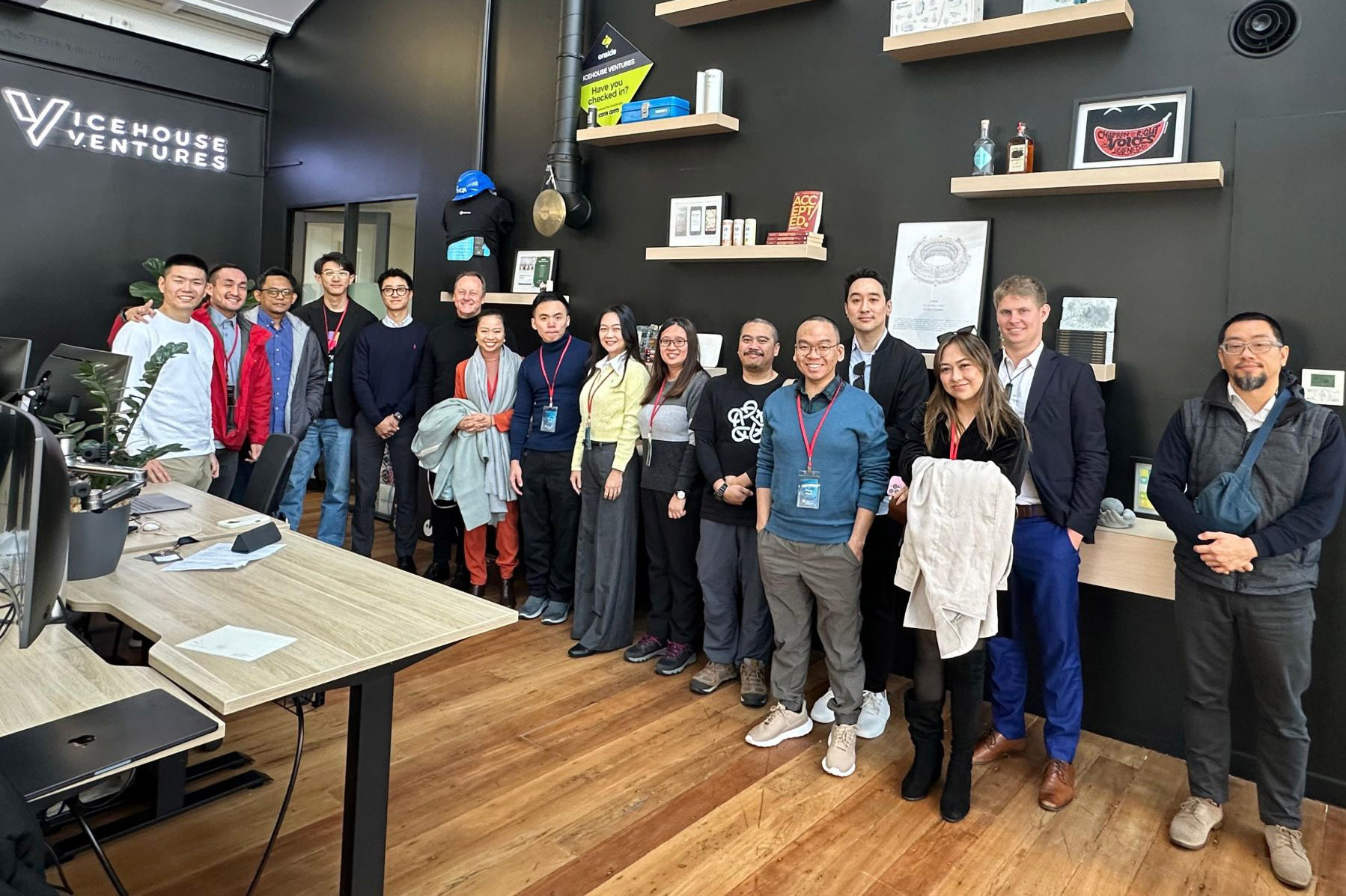 The entrepreneurs posing for a group photo at Vivehouse Pictures' office