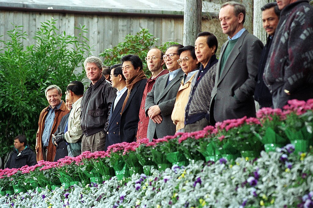Asia-Pacific Economic Cooperation (APEC) leaders lined up for a group photo on an outdoor terrace