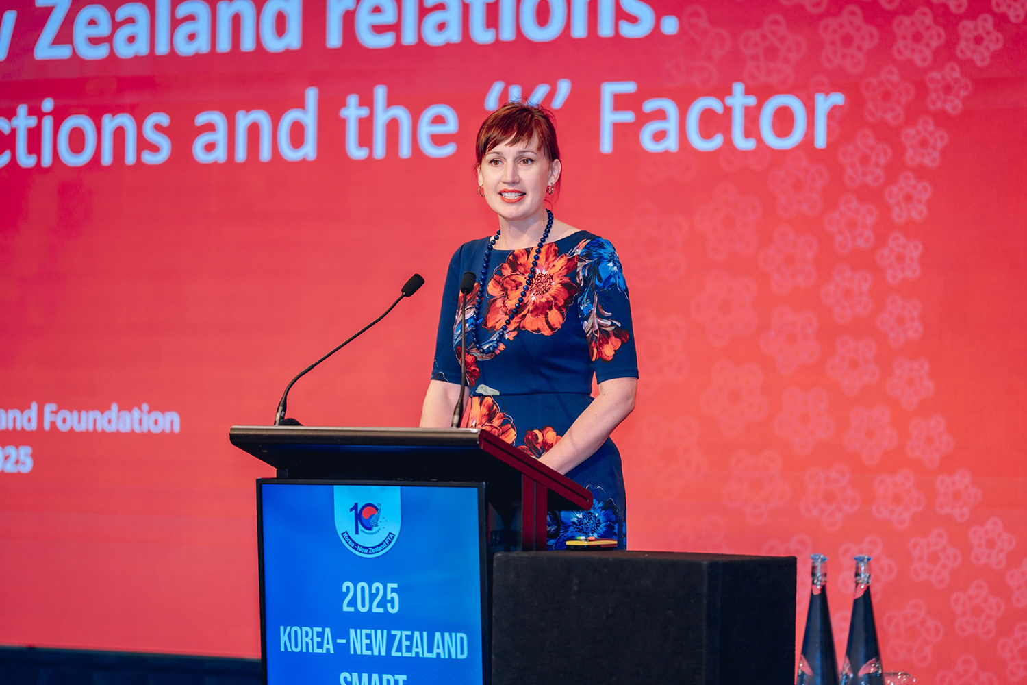 Suzannah Jessep speaking at a podium