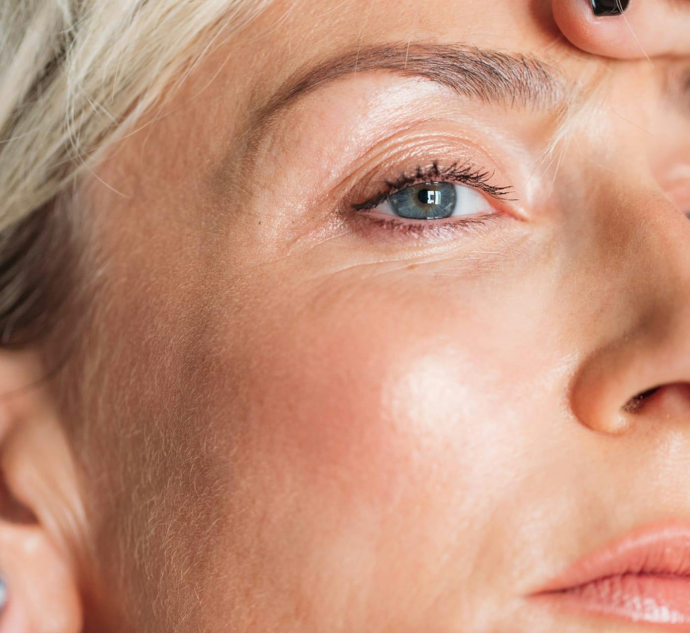 Close-up of a woman’s cheek and eye