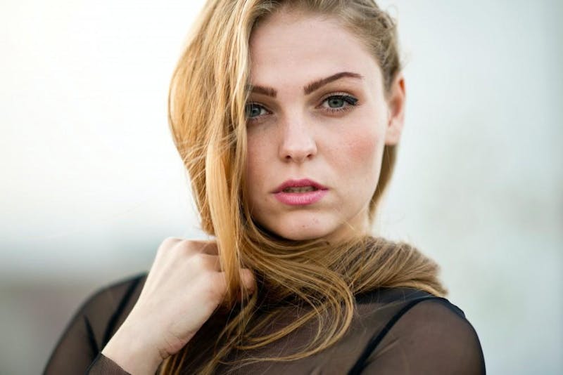 woman in sheer blouse
