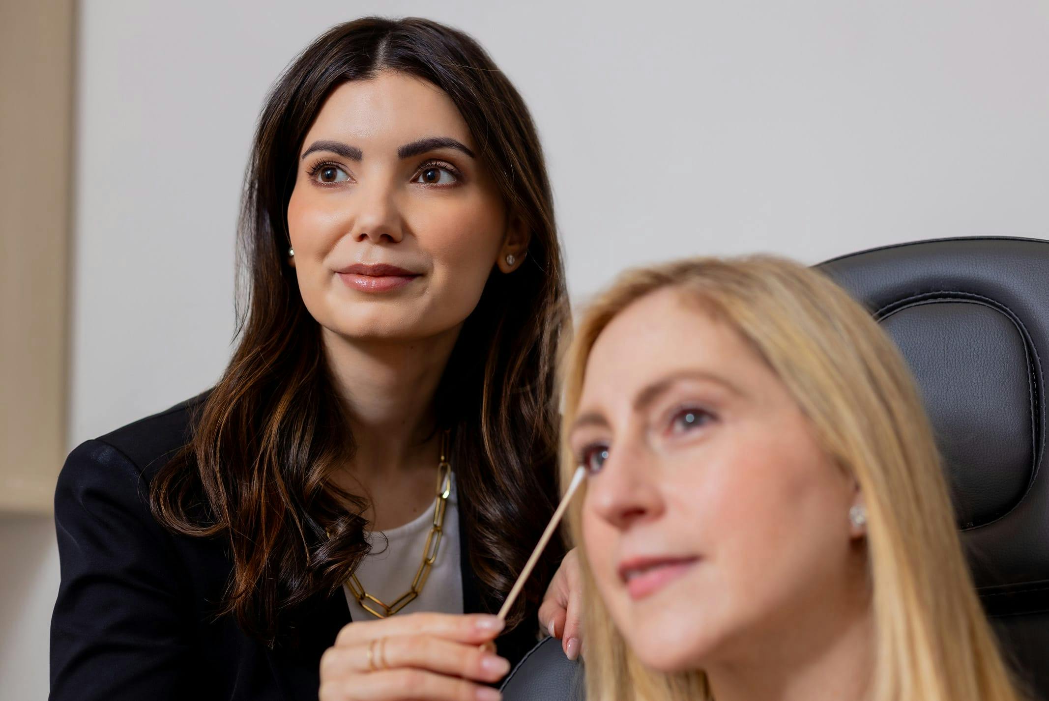 doctor treating patient's eyes