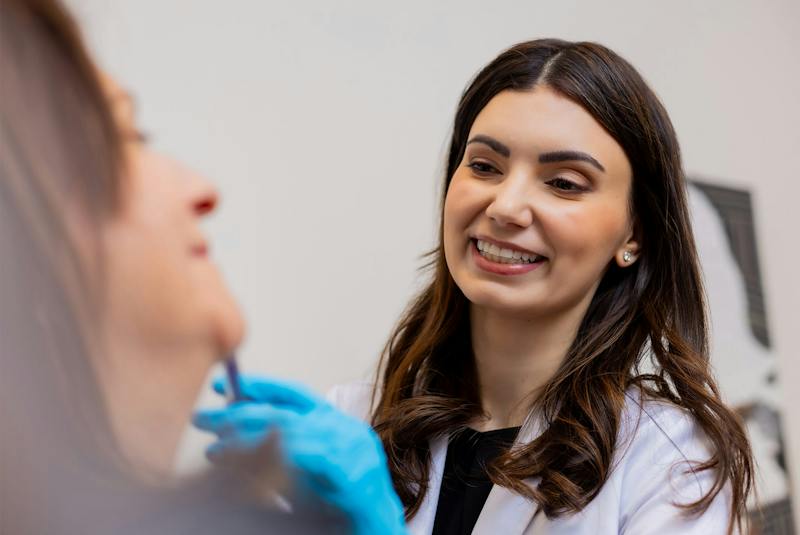 doctor treating patient