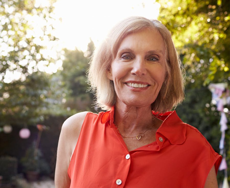 woman smiling outside