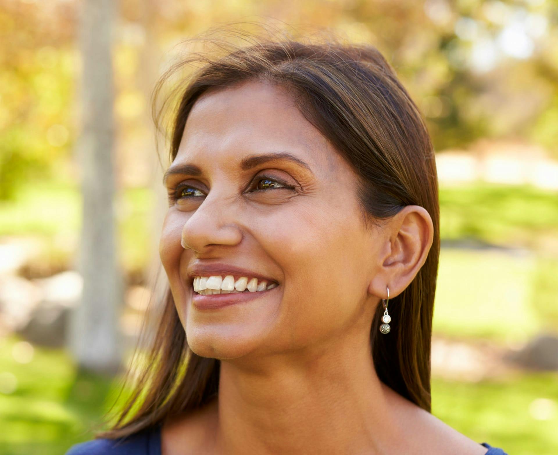 woman smiling outside