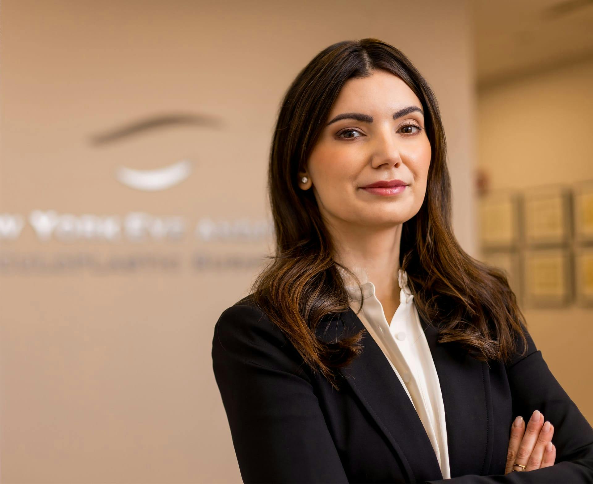 Dr. Carniciu standing at front desk