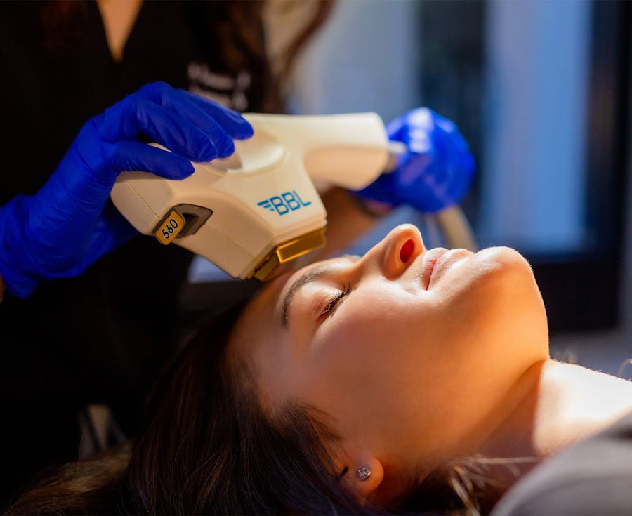 doctor performing laser procedure