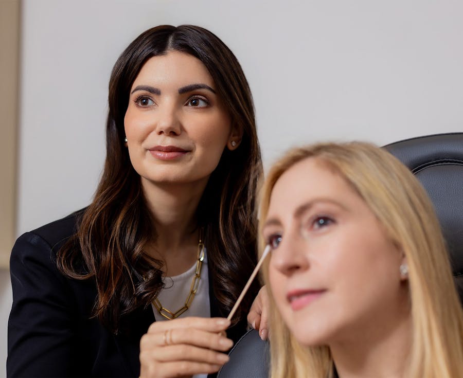 woman turning head and smiling