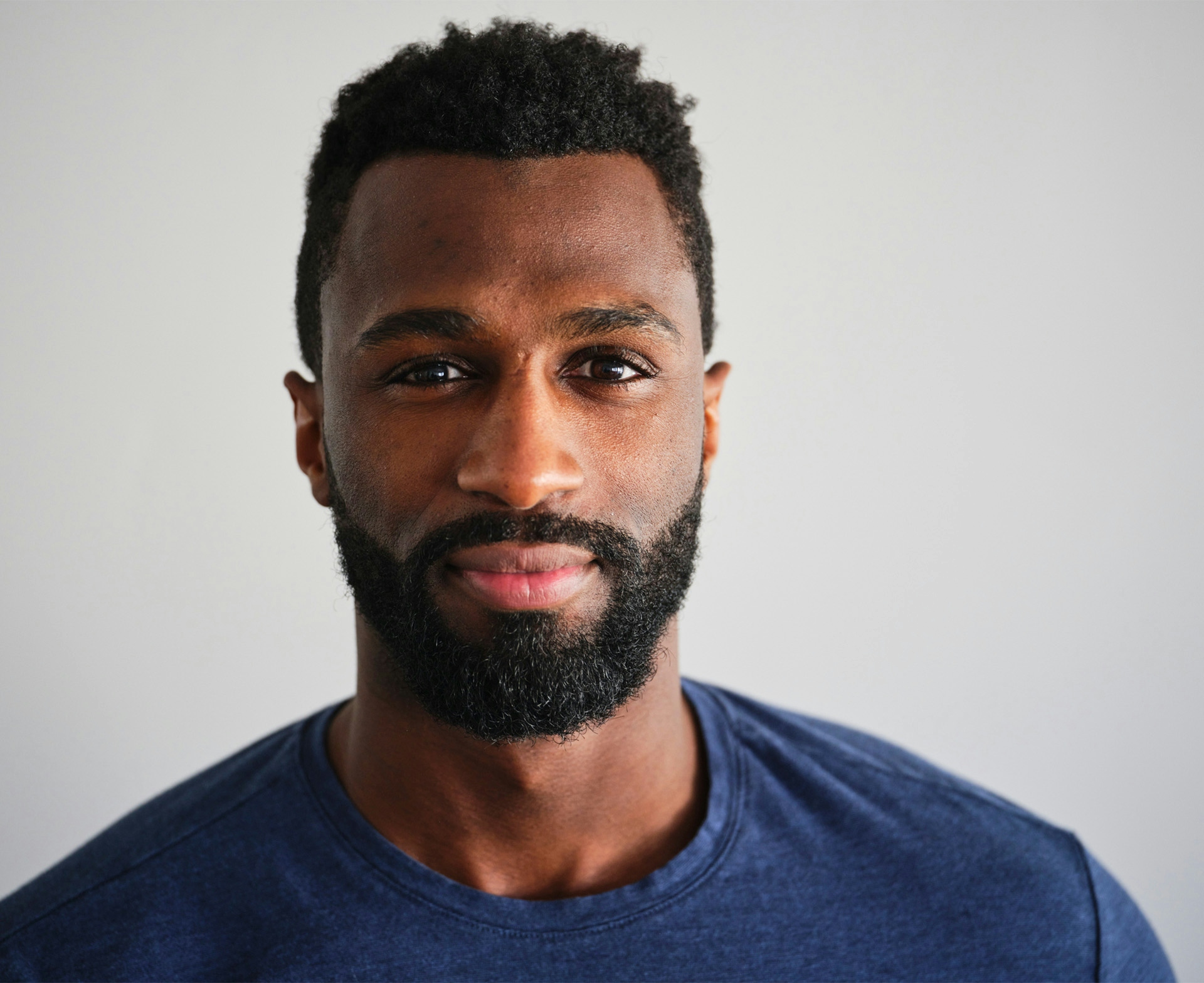 man in white sweater