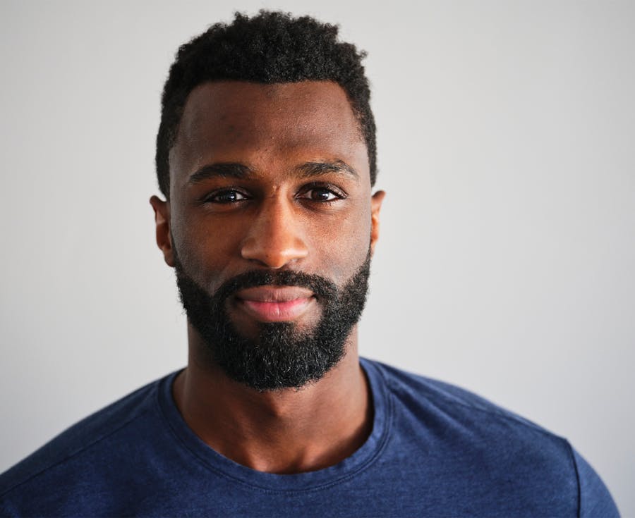 man in white sweater