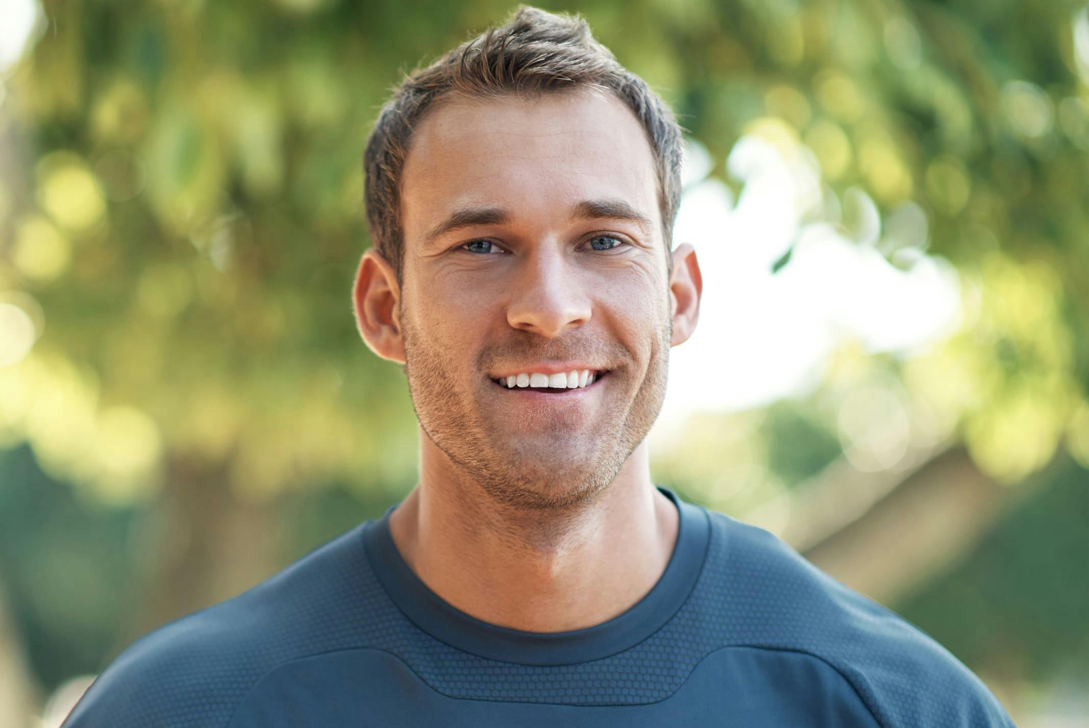 man smiling at the camera