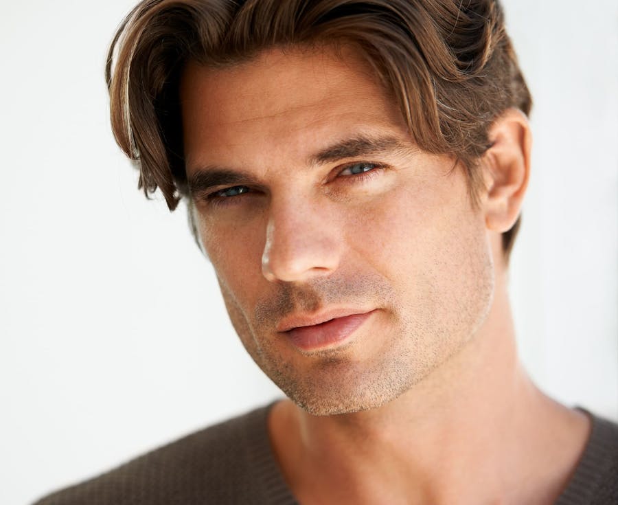 man squinting at the camera