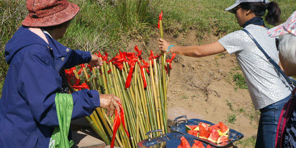 Chinese descendents offering incense