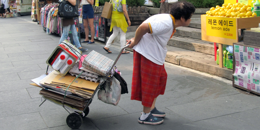 Elderly woman collecting rubbish in South Korea