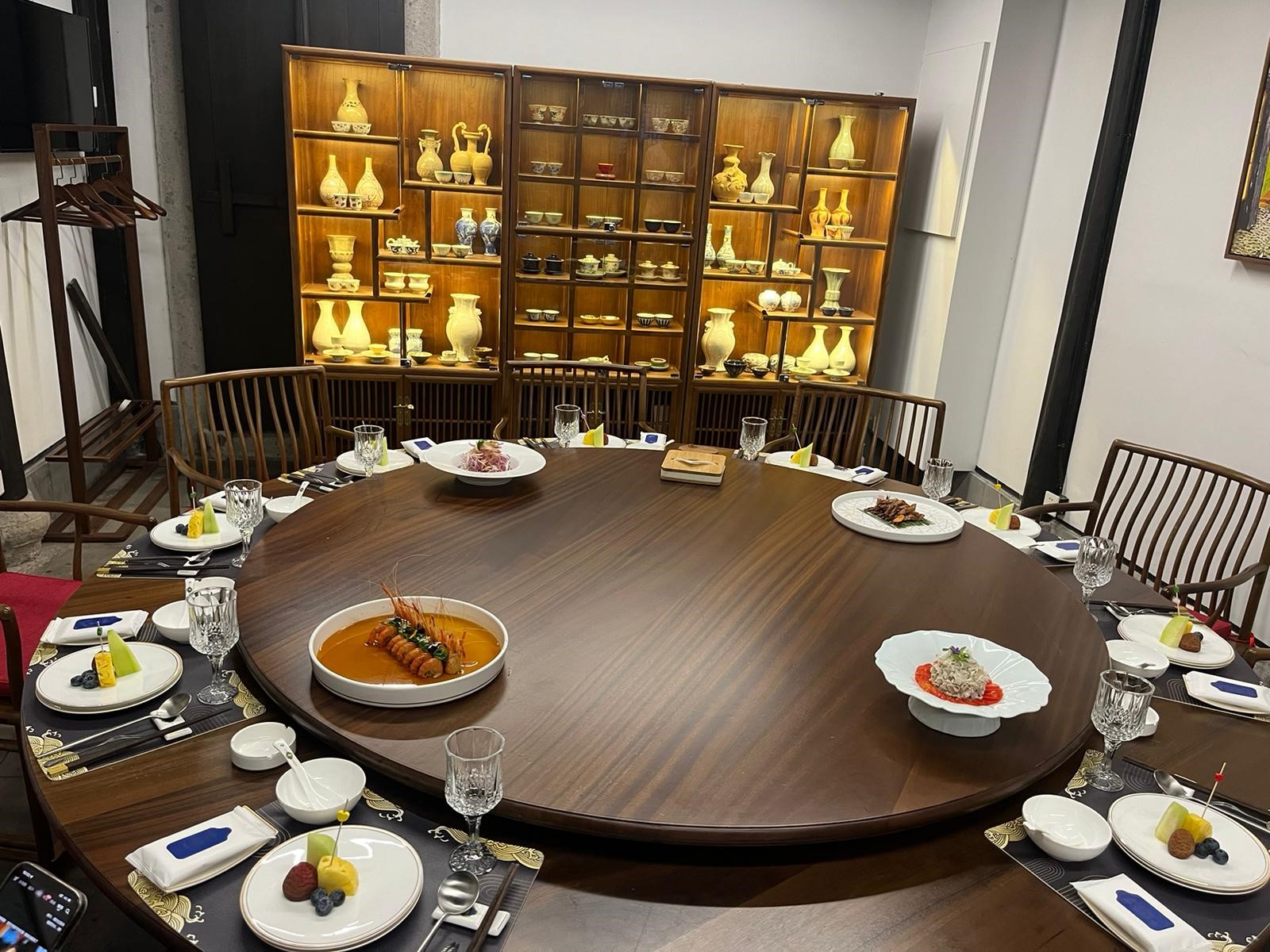 A round table set with food