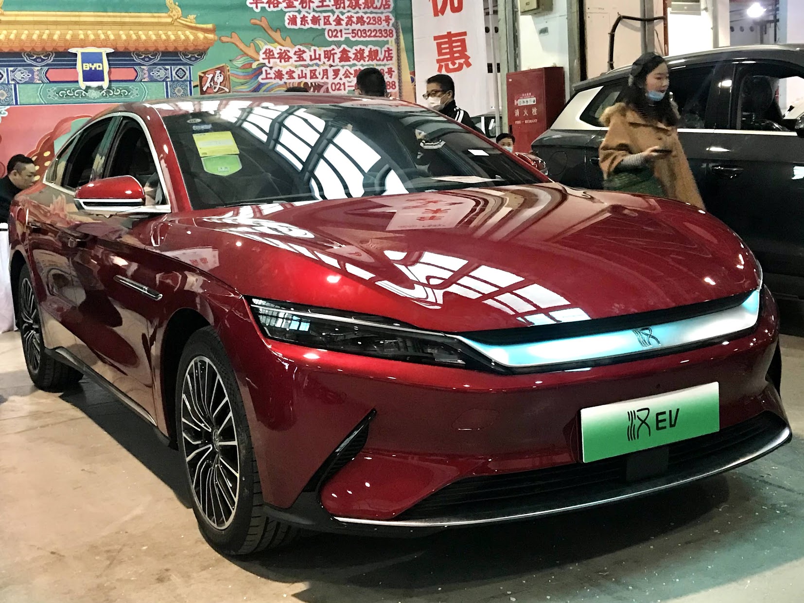 A red show car on display in a Chinese function centre