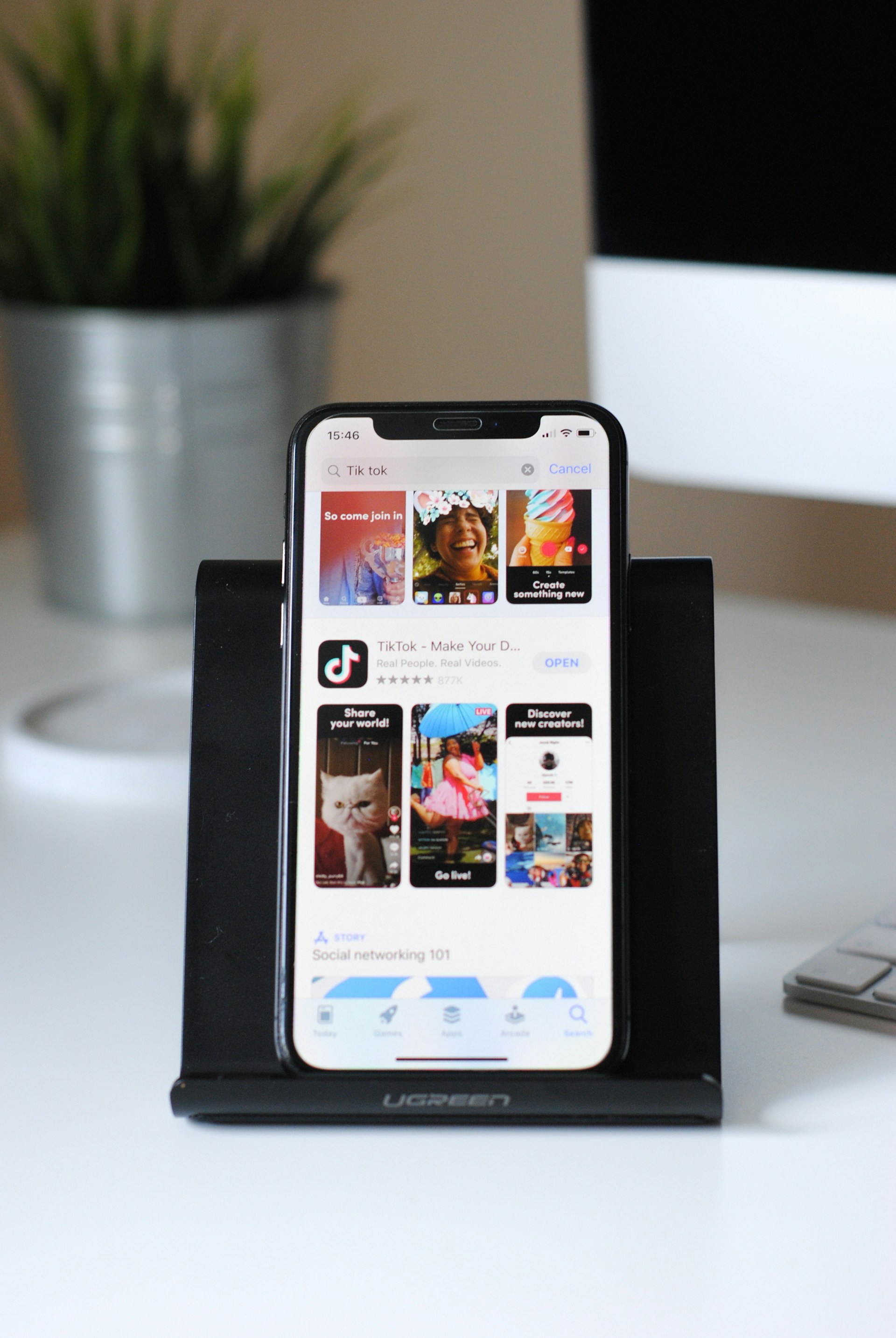 A phone showing social media apps in an app store.