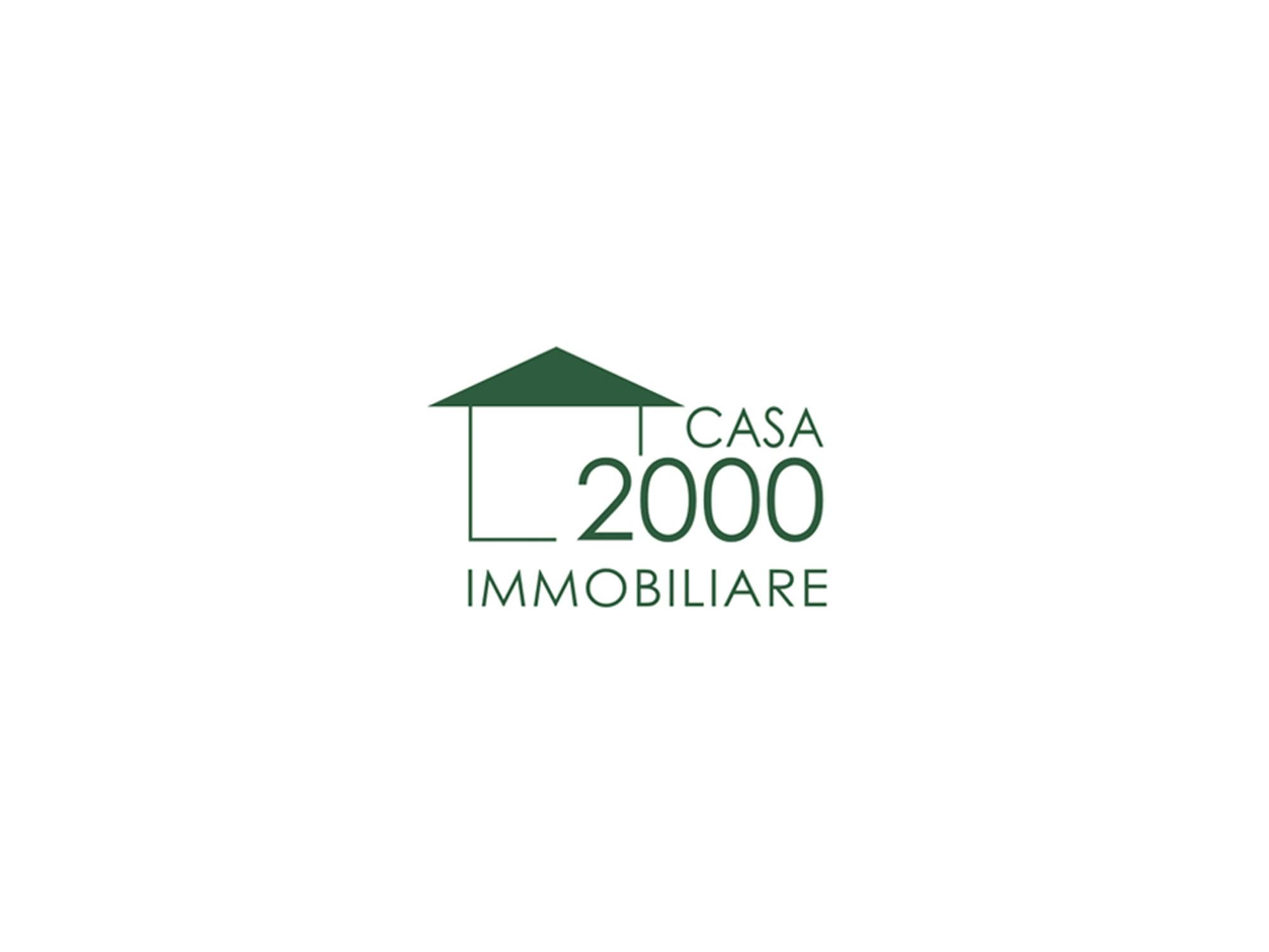 logo agenzia casa 2000
