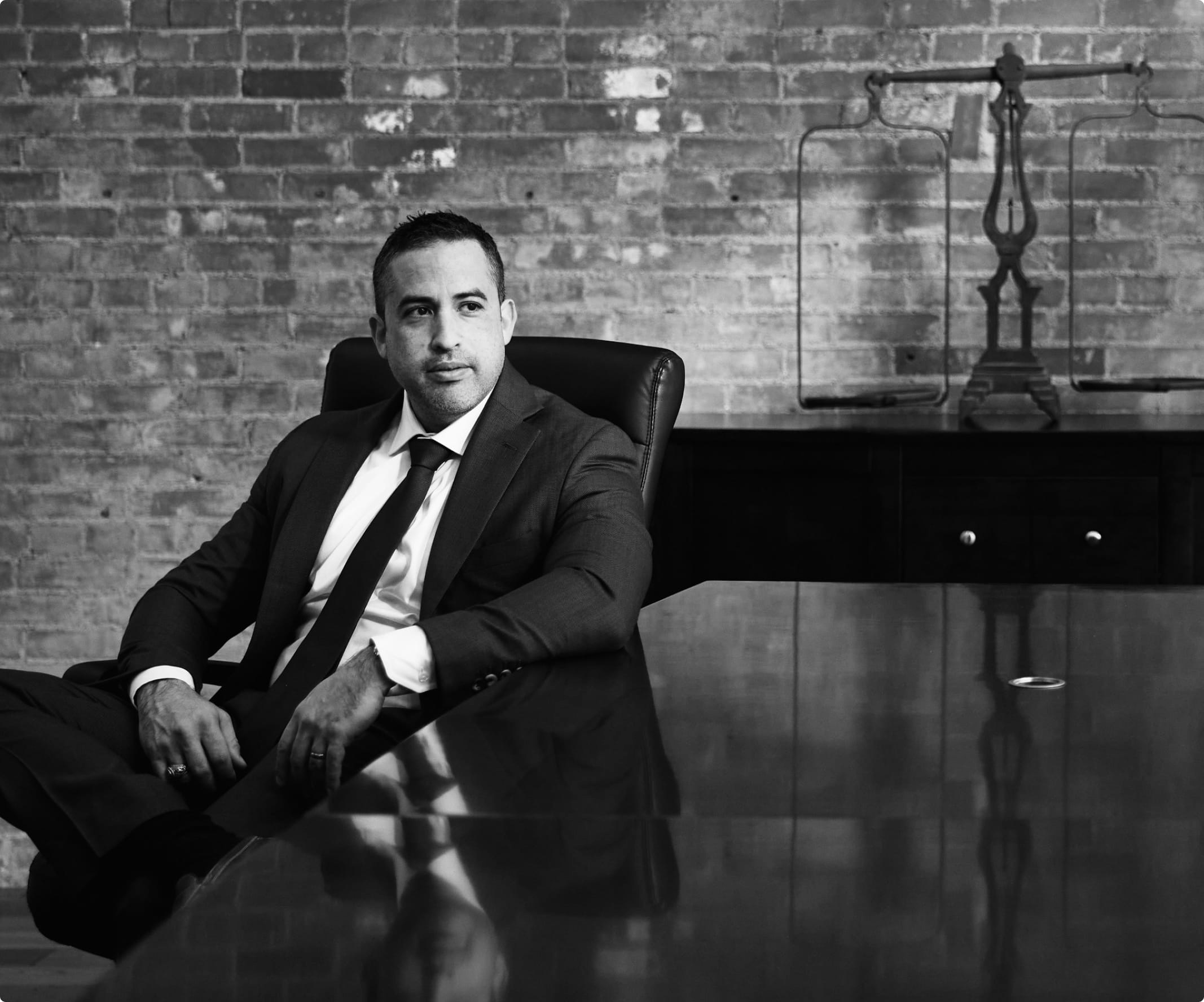 Attorney Gutierrez sitting in a chair