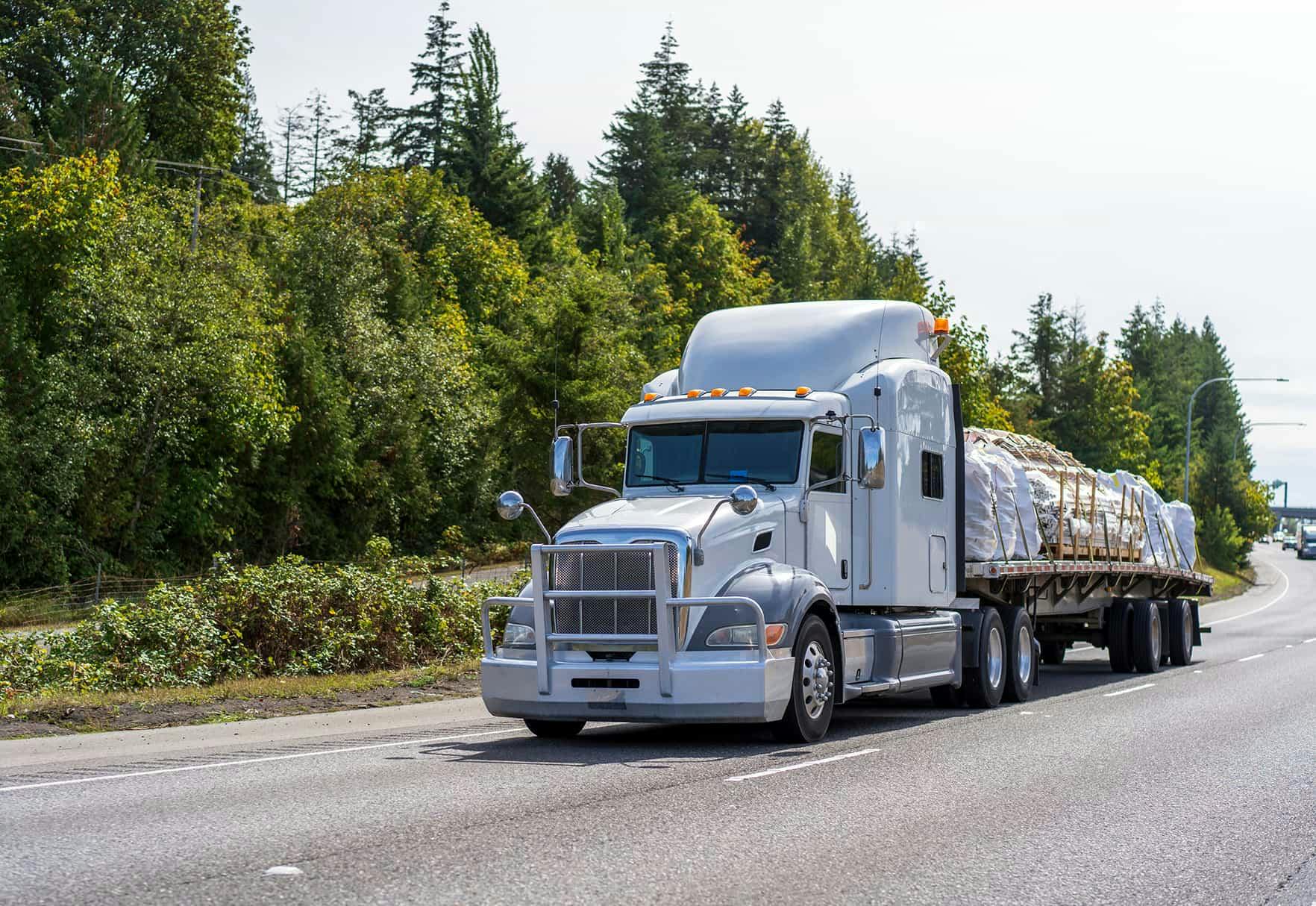 Commercial truck driving down the freeway