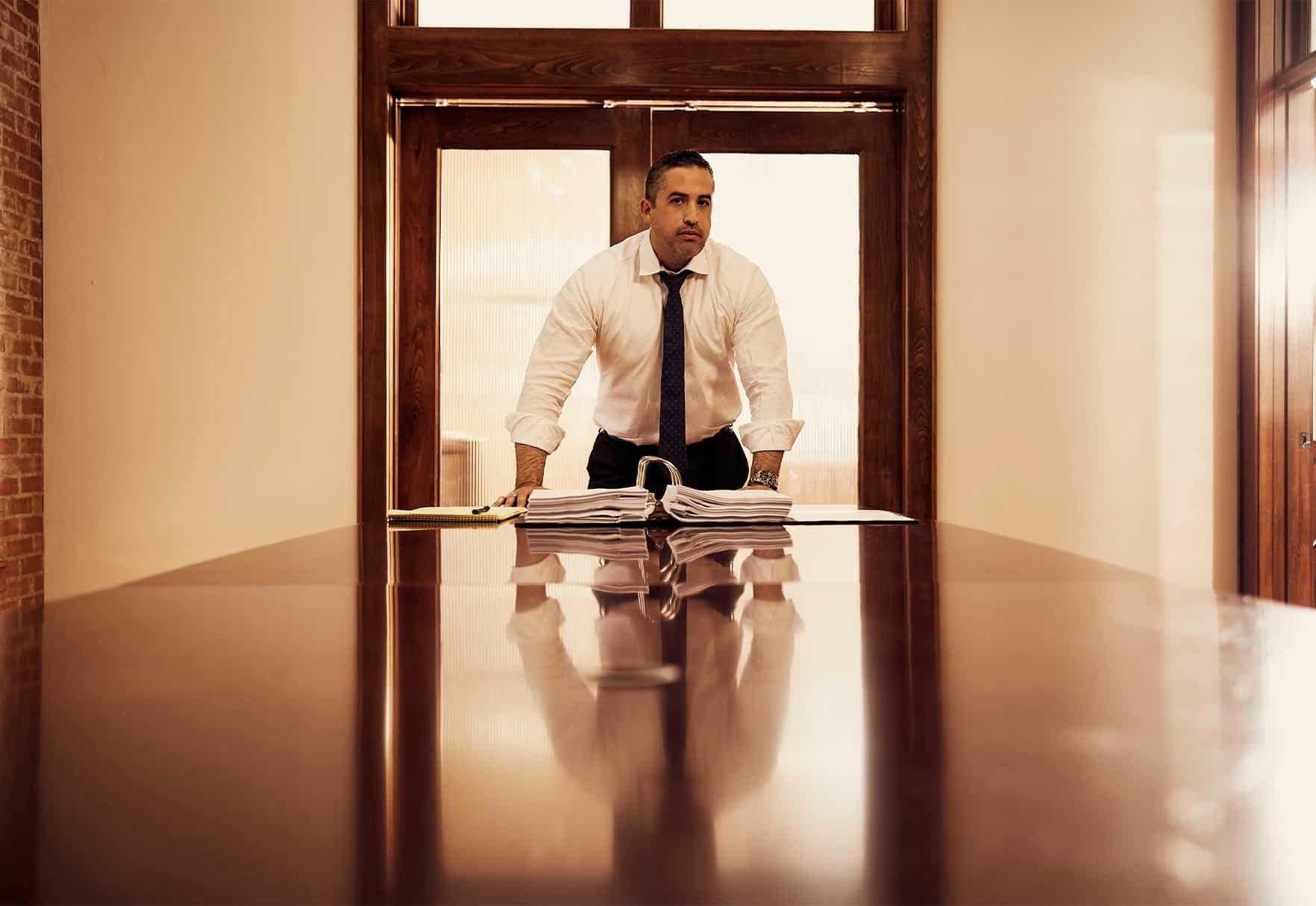 Brian Gutierrez standing at a table