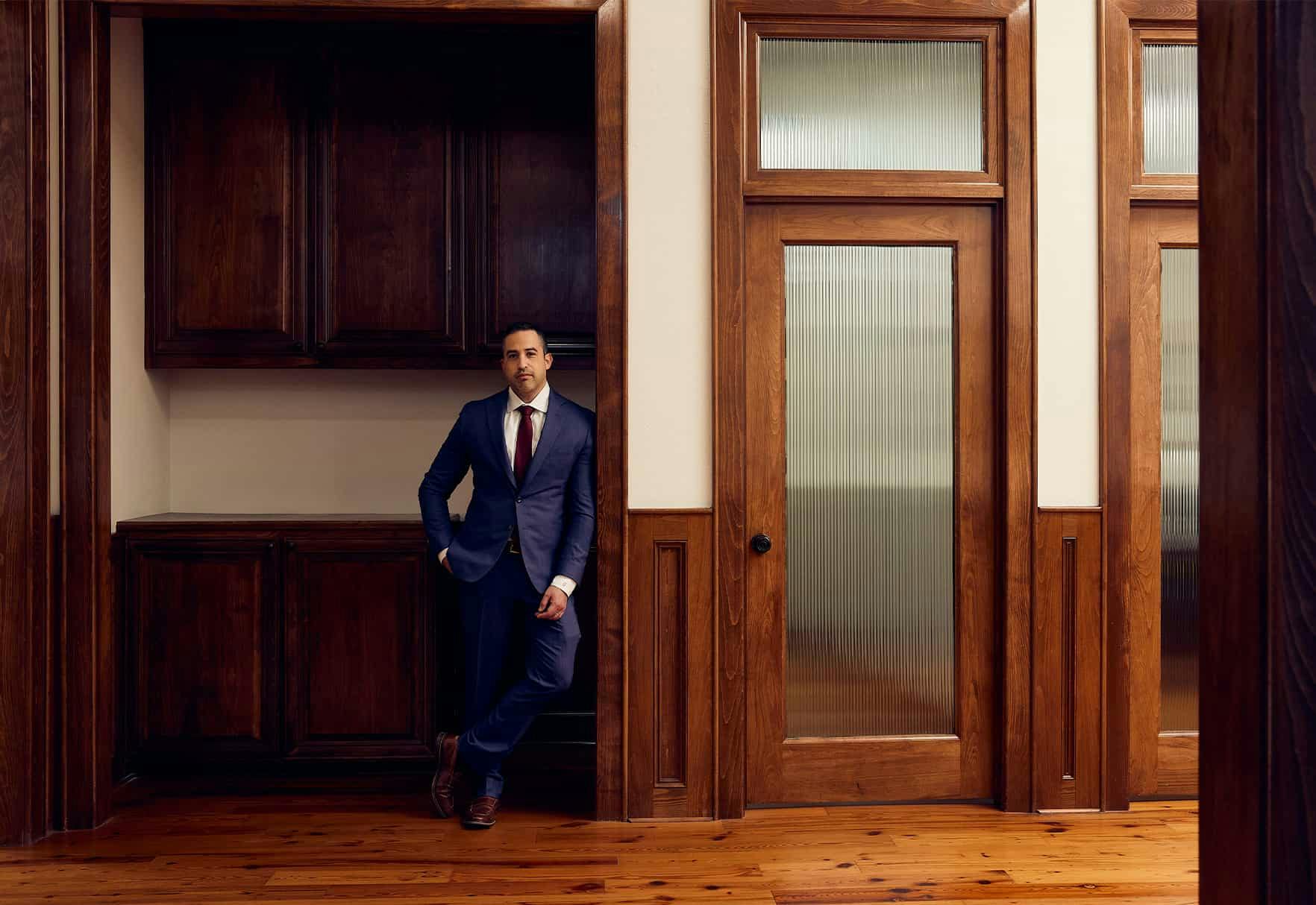 Brian Gutierrez standing in a hallway