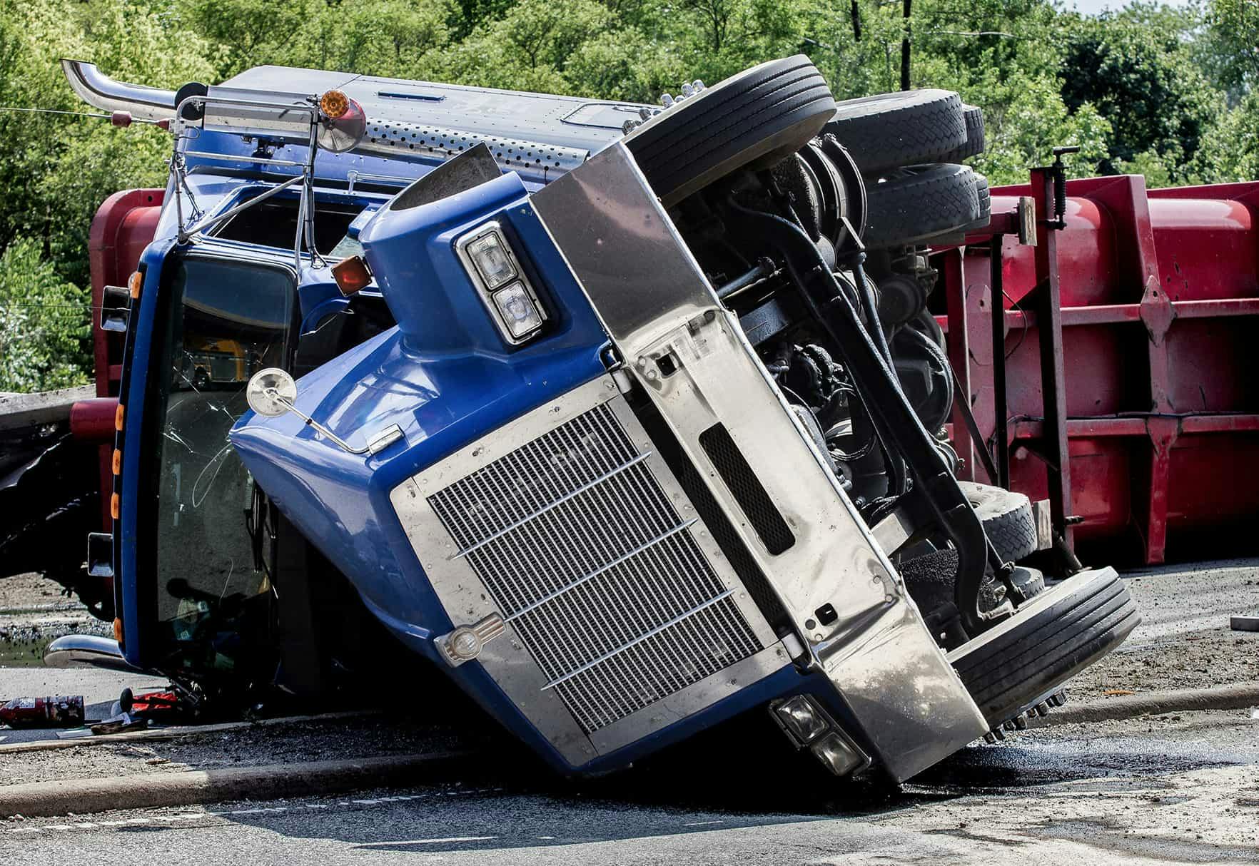 An 18-wheeler flipped on it's side